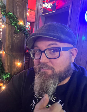 Loyal and satisfied fan Justin wearing a Boston Scally Irish Rose Cap