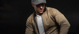 Man wearing Boston Scally Jacket and a Cap