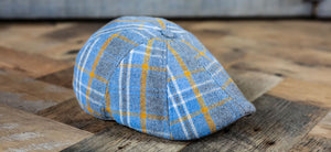 The Spring Rose cap is here, featuring a grey, light blue and golden yellow plaid