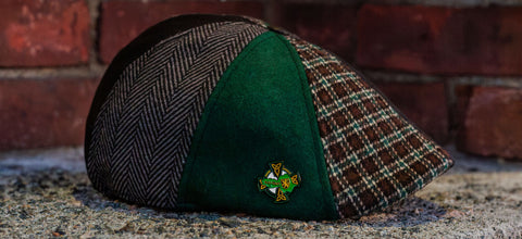 The Galway cap is here - featuring a patchwork of plaid, herringbone and solid black and green