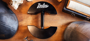 The BSC Hat Stretcher on a Wooden Table